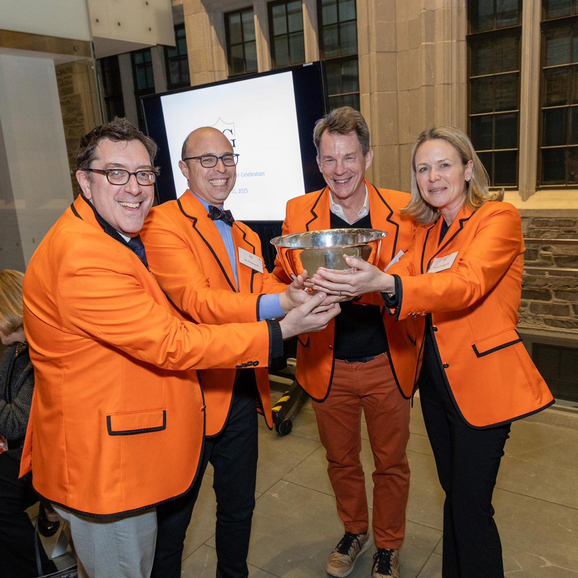 Class of 1926 Trophy winners: 1999 Class Agents Josh Epstein ’99, Ari Weinberg ’99 and Taylor Pavelski ’99 with Pat Blake’86, senior associate director or Annual Giving (second from the right)